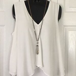 Green envelope white top.